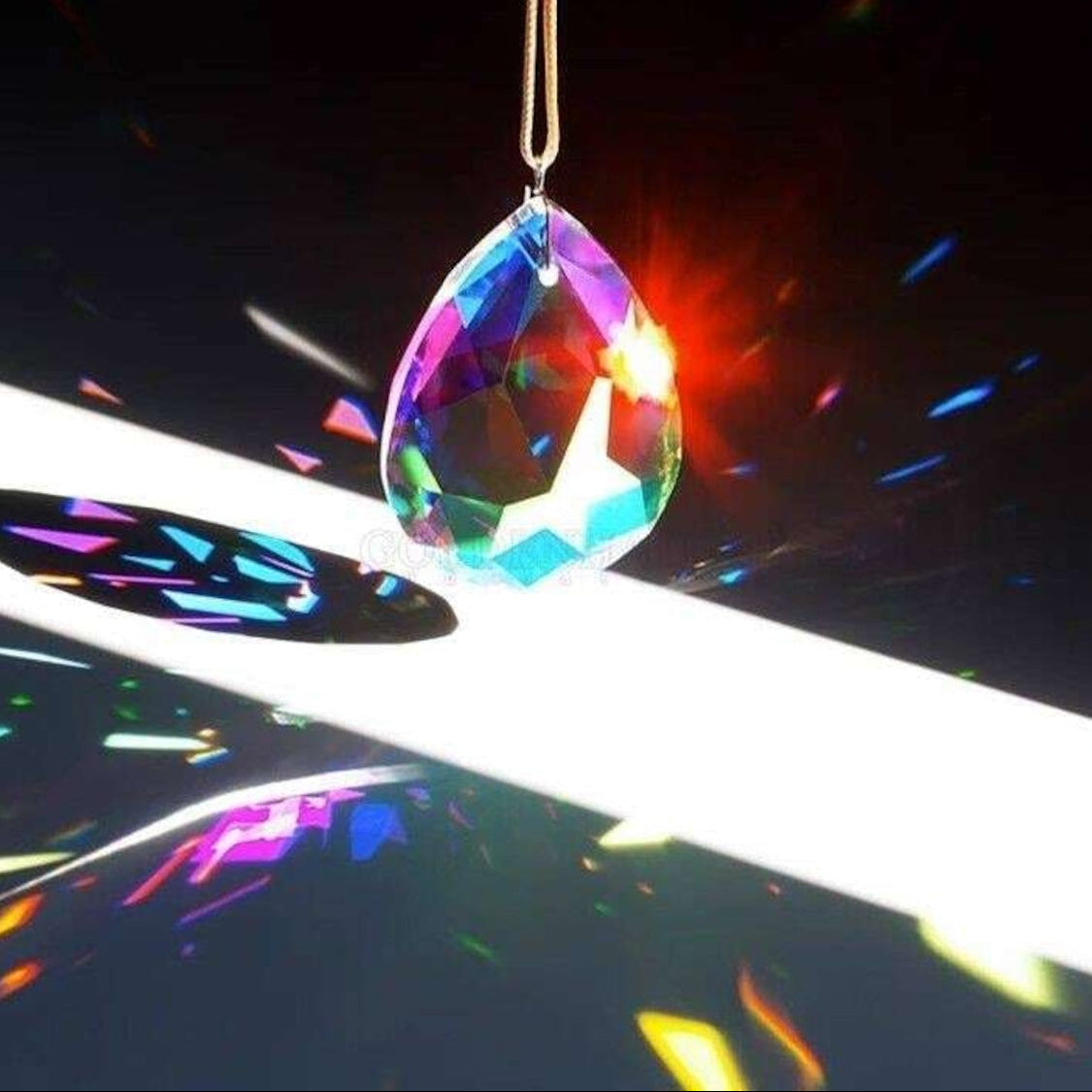 PrismGlow Crystal Suncatcher - lightbloom-drop-crystal-suncatcher