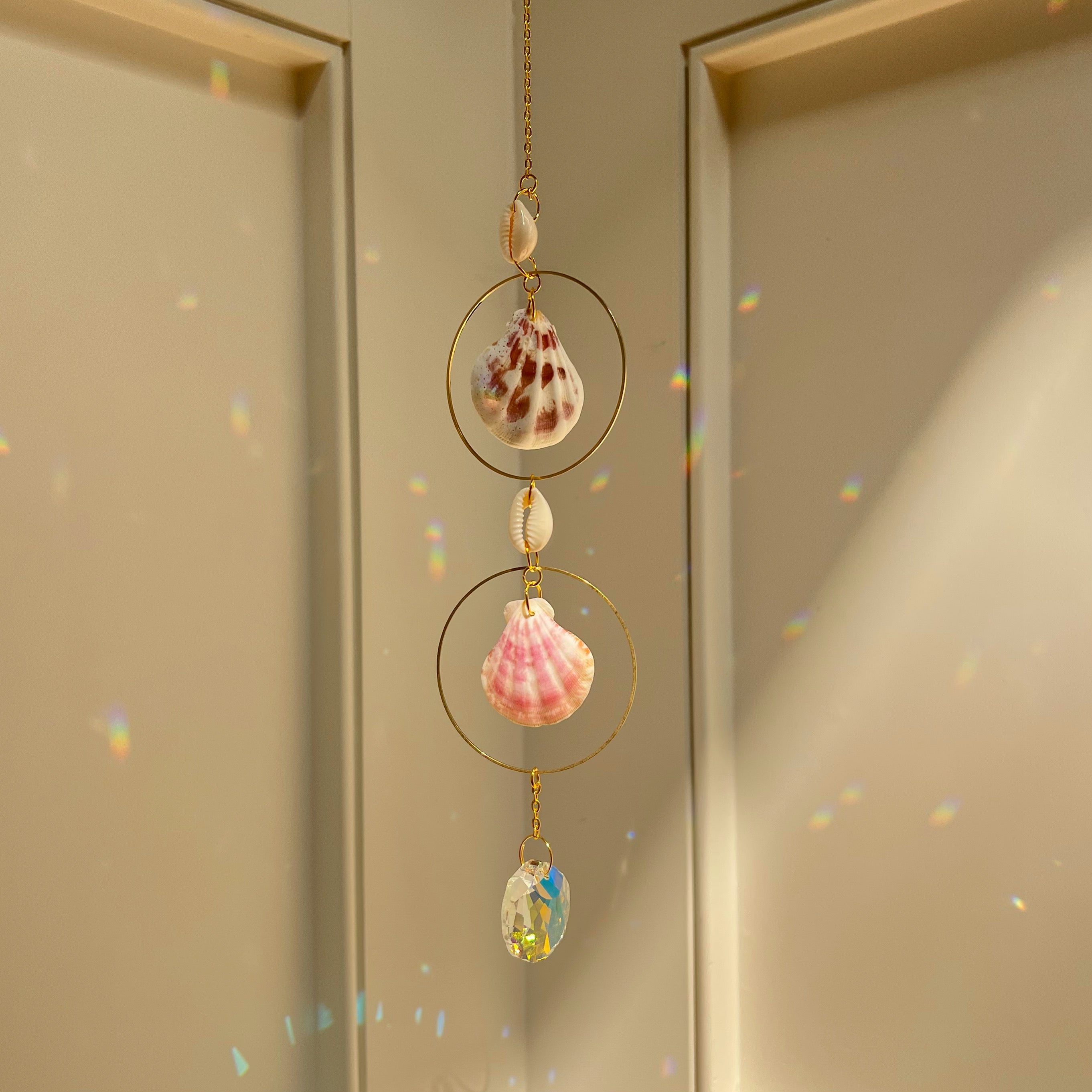 PrismVeil Nautilia — Hanging Sea Shell Crystal Suncatcher